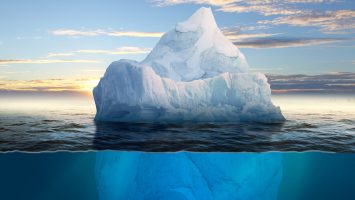 Antarctic iceberg in the ocean. Beautiful polar sea background.